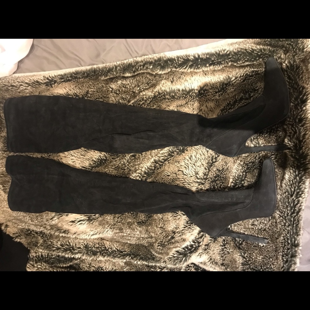 Thigh high black boots